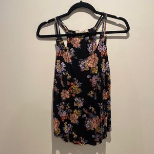 Floral, soft spaghetti strap blouse. Size small. Worn once.